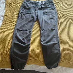 Size 10 REI light-weight cargo pants. 98% cotton. Dark grey. Gently used.